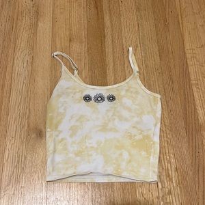 Hollister tank crop top, size extra small, color is yellow and white tie dye.
